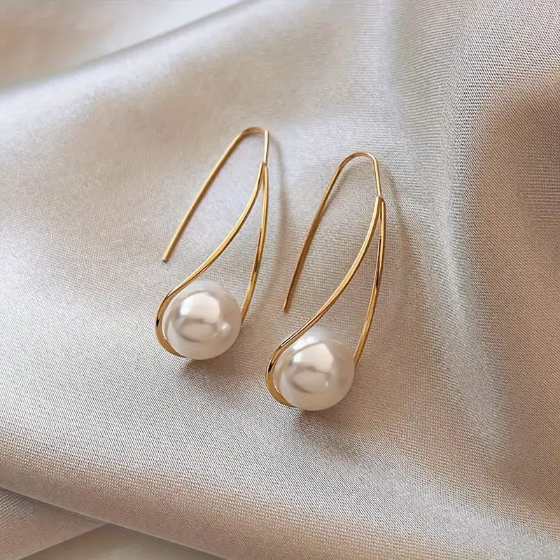 Boucles d'oreilles pendantes en or perlée