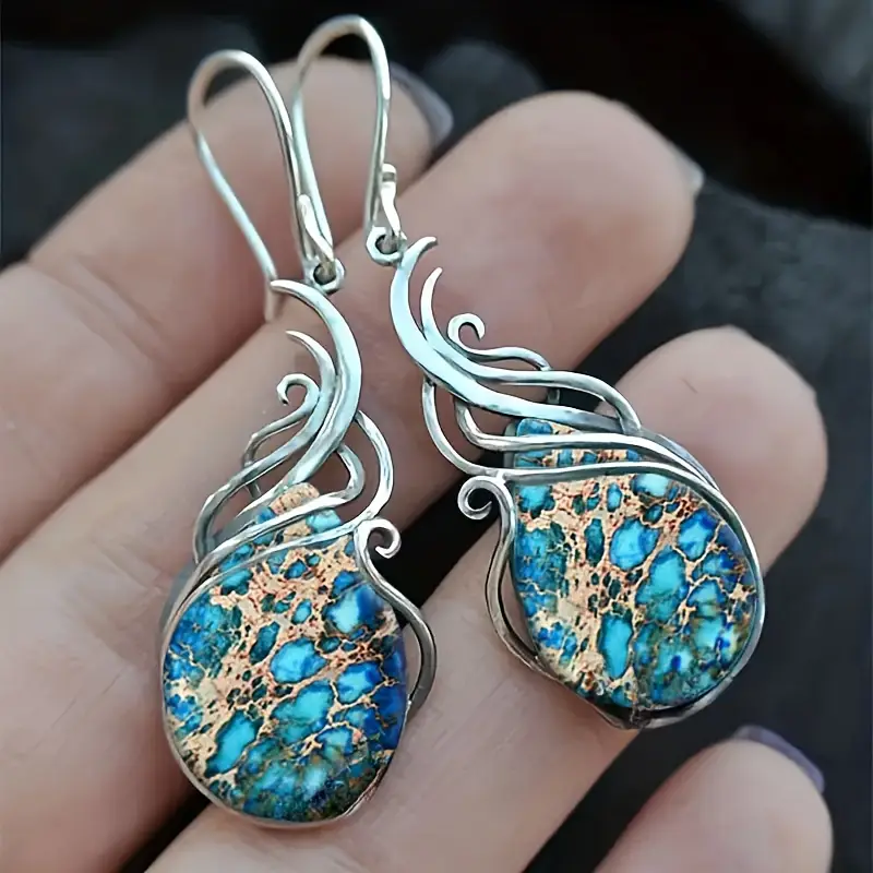 Boucles d'oreilles en argent avec pendentif en pierre bleue