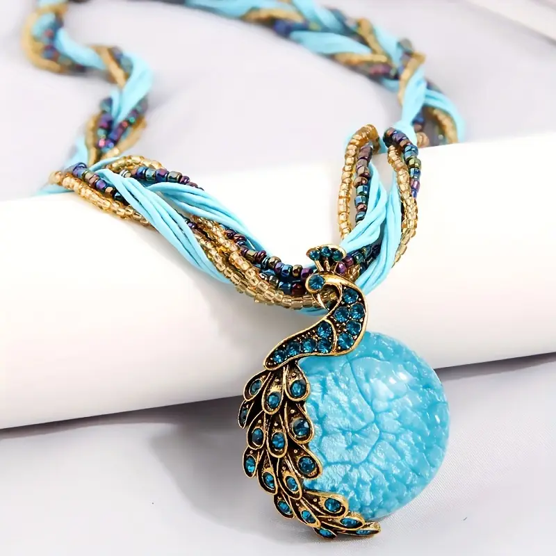Collier avec boule en cristal bleu