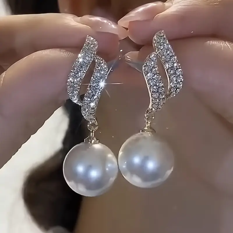 Boucles d'oreilles pendantes avec perle et zirconium