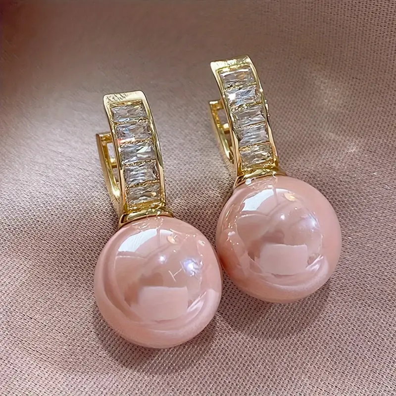 Boucles d'oreilles en or avec zirconium Pearl Rose