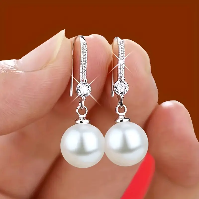 Boucles d'oreilles en perles de zirconium doré