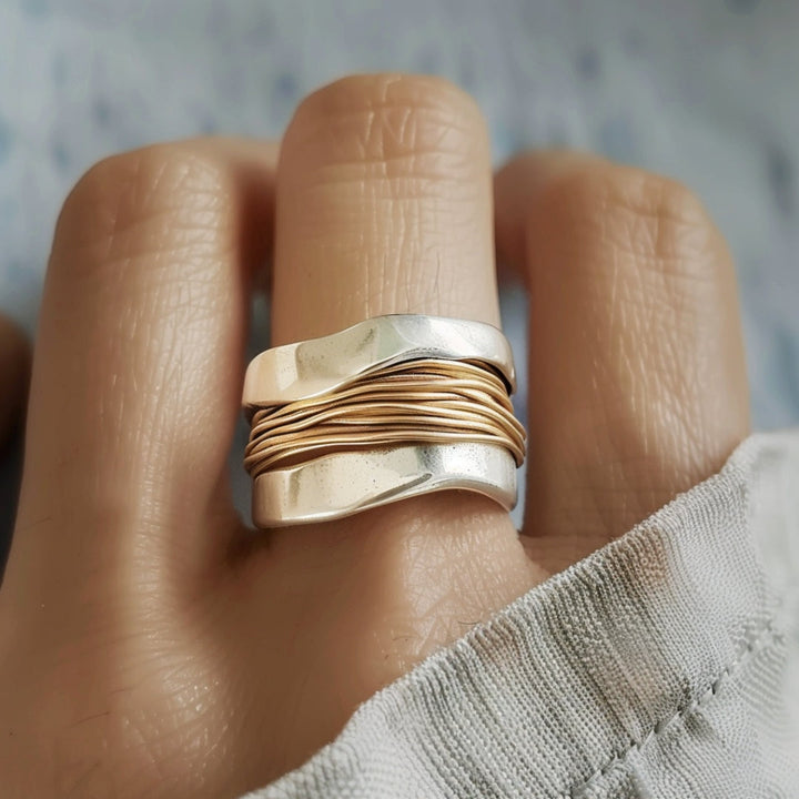 Bague à fils d'argent doré