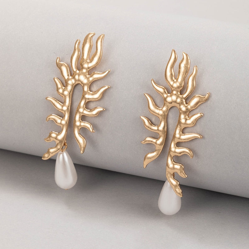 Boucles d'oreilles en corail avec finition perle d'eau douce