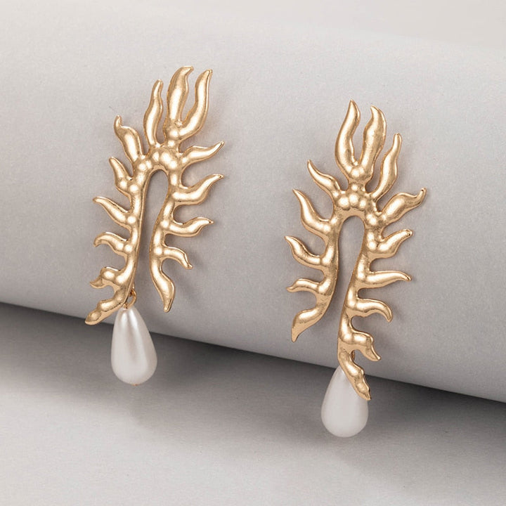 Boucles d'oreilles en corail avec finition perle d'eau douce