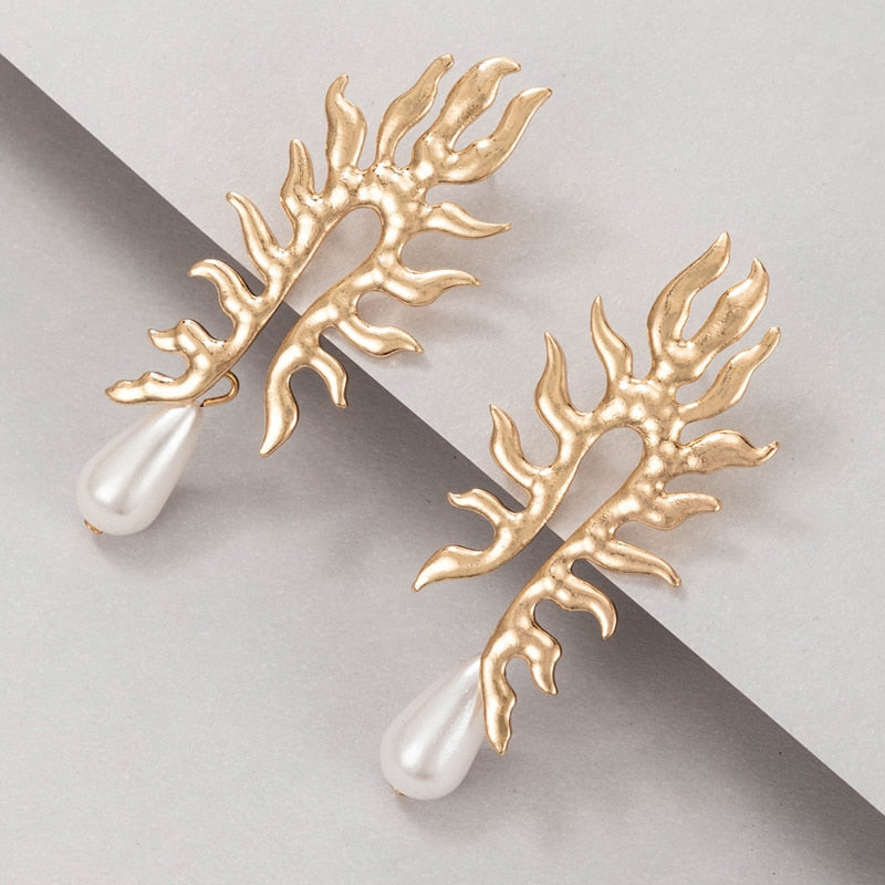Boucles d'oreilles en corail avec finition perle d'eau douce