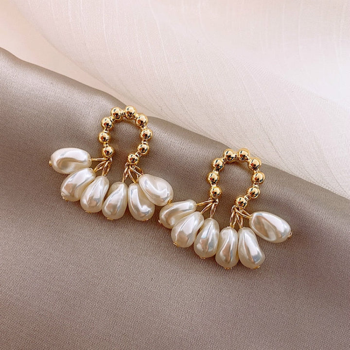 Boucles d'oreilles élégantes en perles baroques