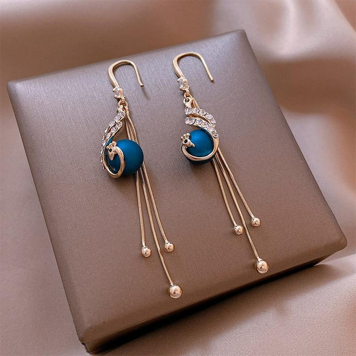 Boucles d'oreilles festives en perles bleues élégantes