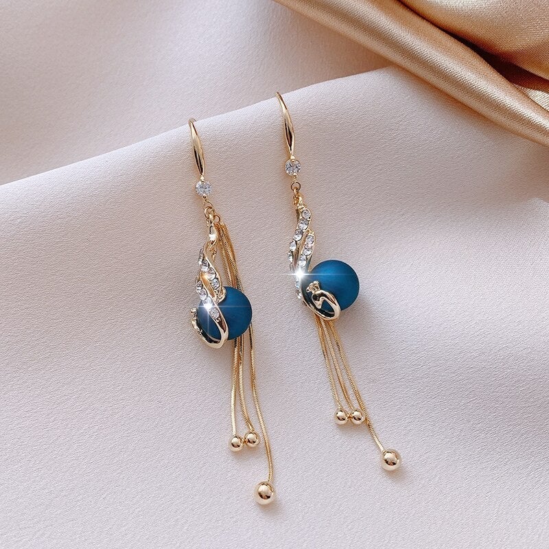 Boucles d'oreilles festives en perles bleues élégantes