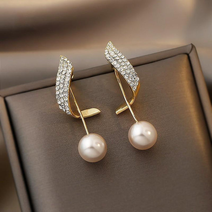 Boucles d'oreilles élégantes en perles d'or