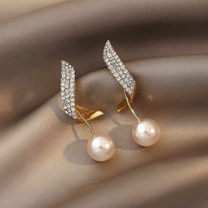 Boucles d'oreilles élégantes en perles d'or