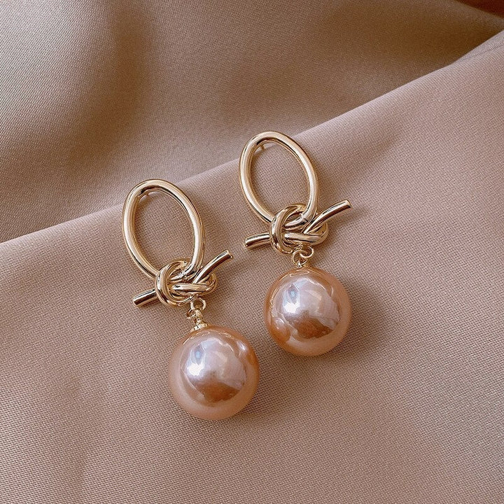 Boucles d'oreilles boucle d'oreille en perles d'or élégantes