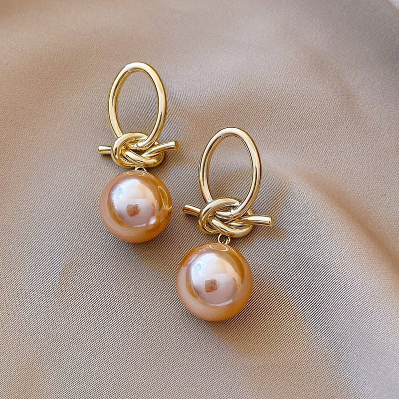 Boucles d'oreilles boucle d'oreille en perles d'or élégantes