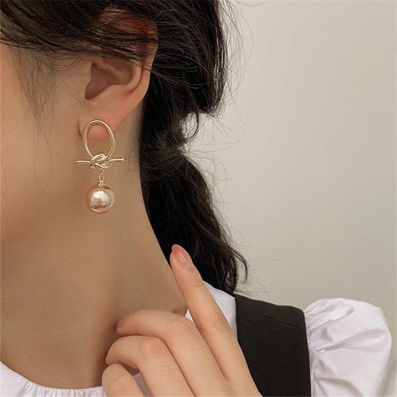 Boucles d'oreilles boucle d'oreille en perles d'or élégantes