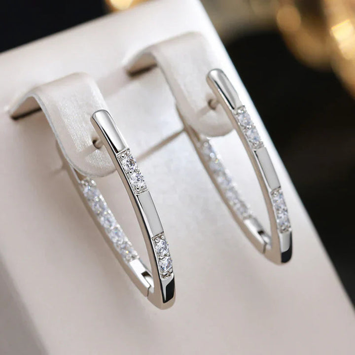 Boucles d'oreilles élégantes en zirconium doré