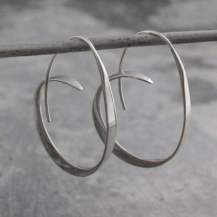 Boucles d'oreilles élégantes en forme de spirale