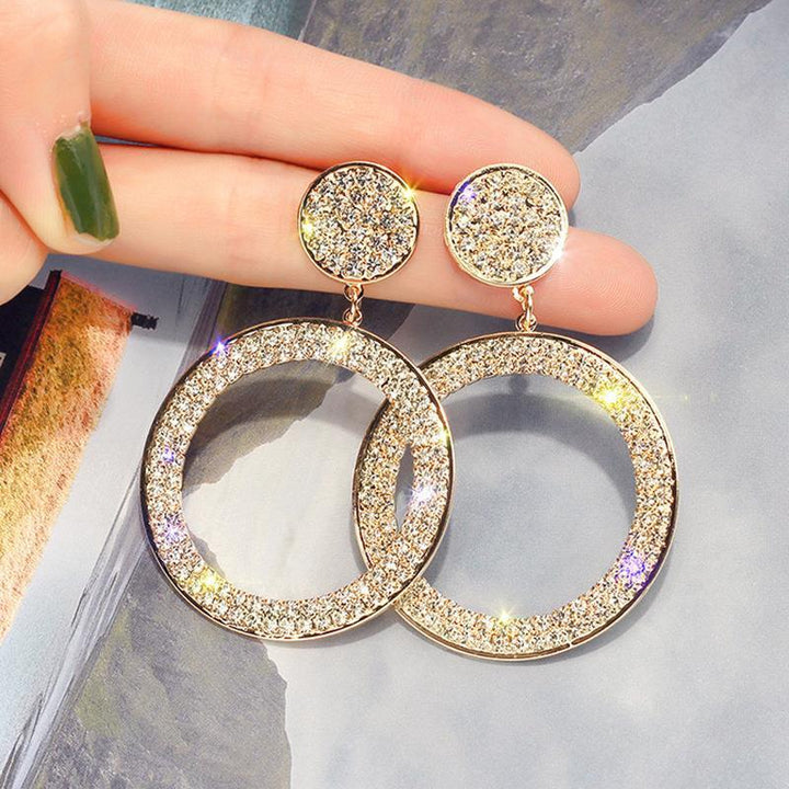 Boucles d'oreilles élégantes en zirconia en or et argent