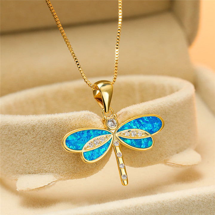 Collier libellule en or avec accent en opale