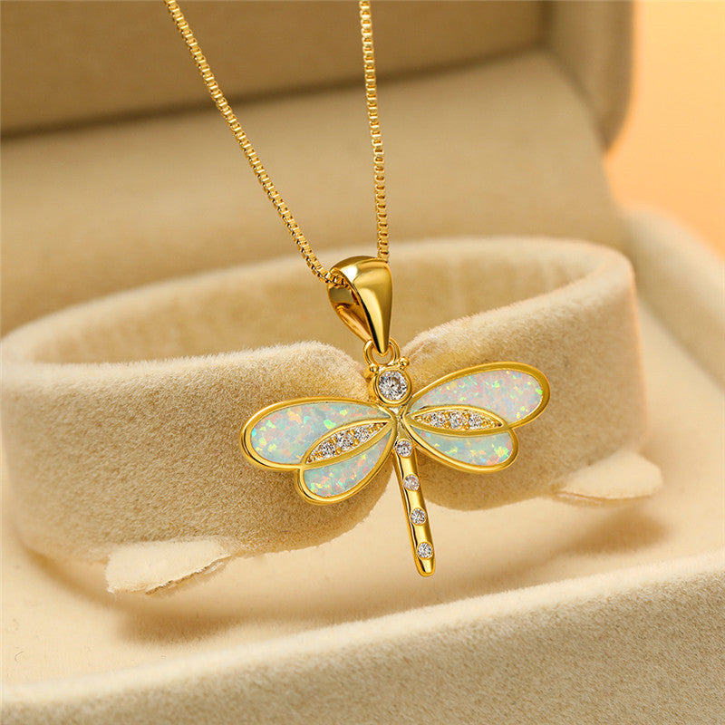 Collier libellule en or avec accent en opale