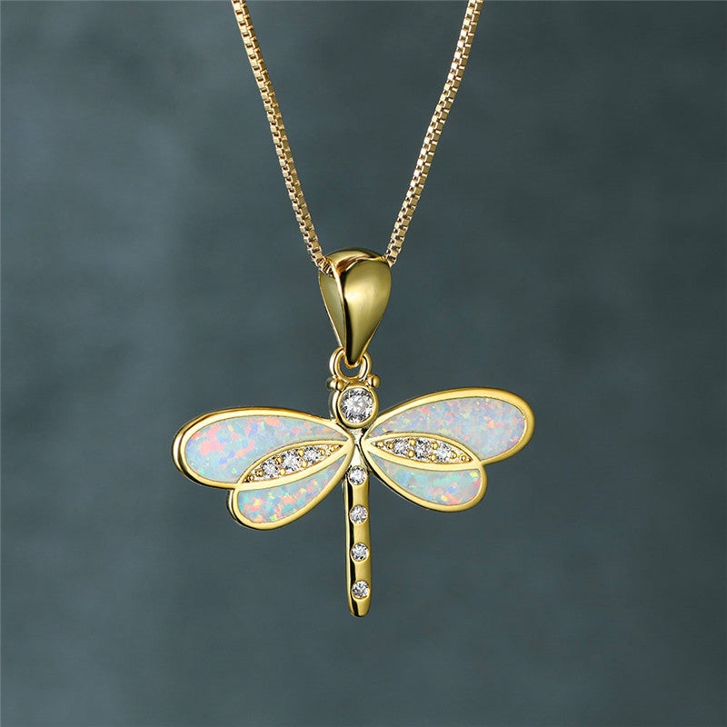 Collier libellule en or avec accent en opale