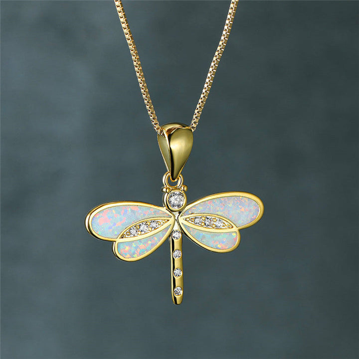 Collier libellule en or avec accent en opale