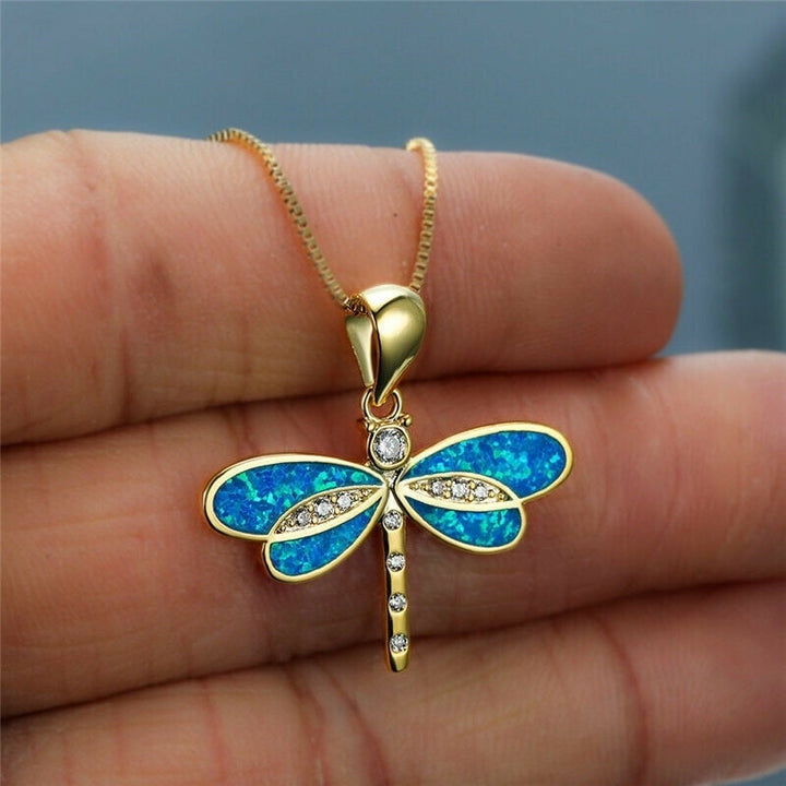Collier libellule en or avec accent en opale