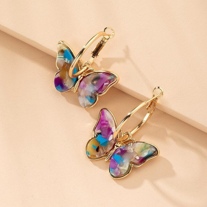 Boucles d'oreilles en cristal et émail peint à la main avec papillon