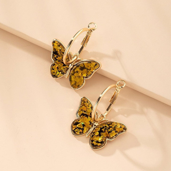 Boucles d'oreilles en cristal et émail peint à la main avec papillon