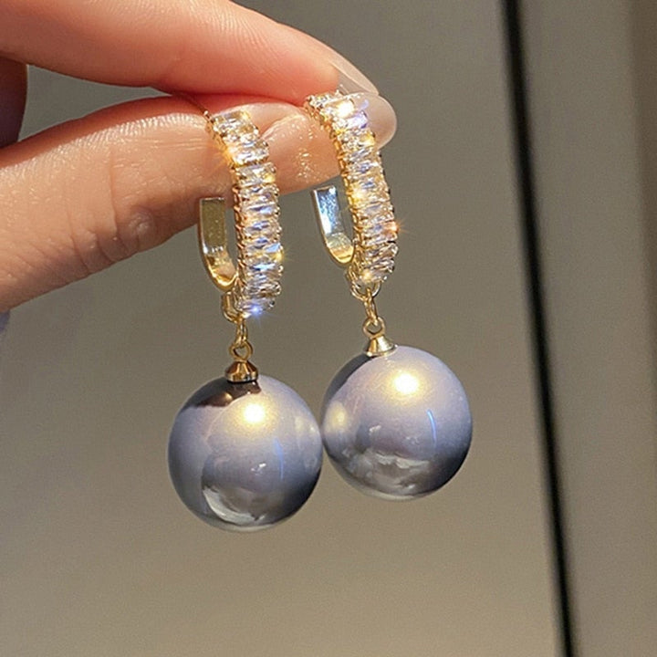Boucles d'oreilles de luxe en perles et zirconiums
