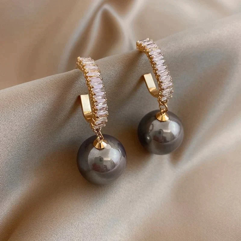 Boucles d'oreilles de luxe en perles et zirconiums