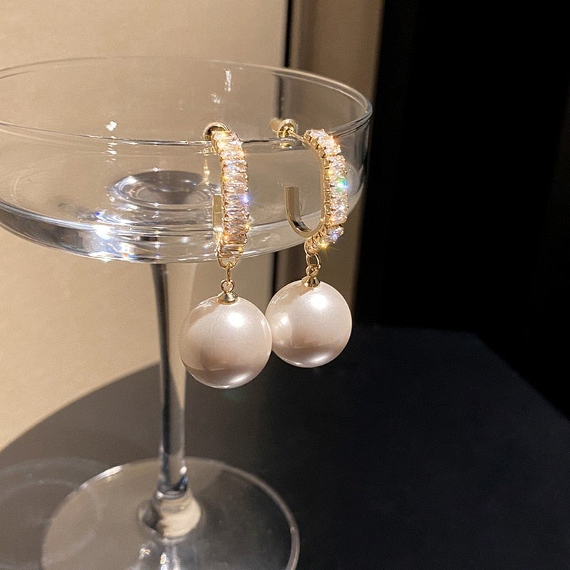 Boucles d'oreilles de luxe en perles et zirconiums