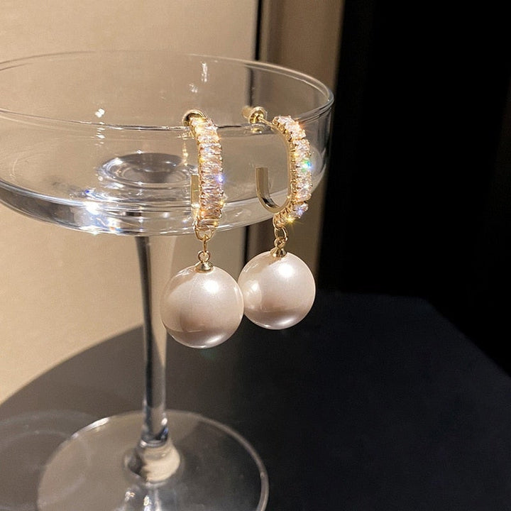 Boucles d'oreilles de luxe en perles et zirconiums