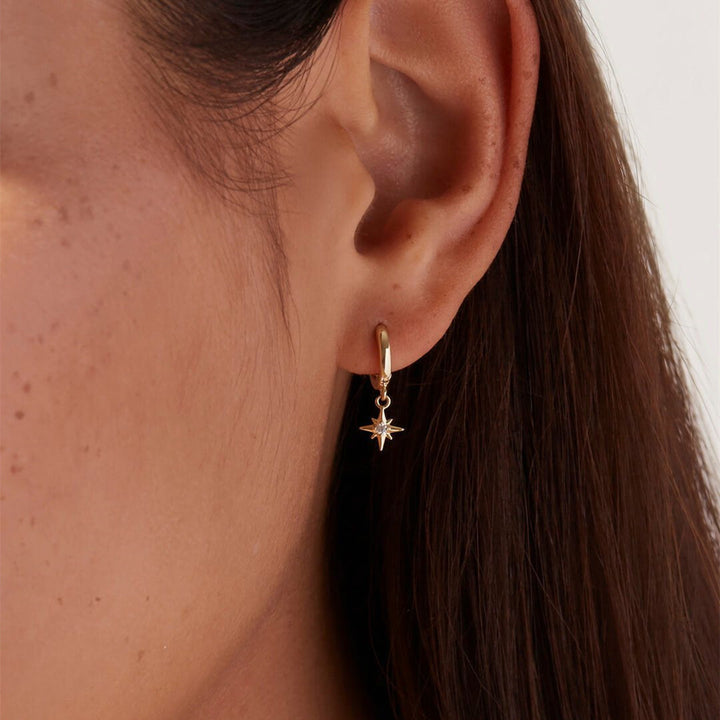 Les boucles d'oreilles Vudu en or