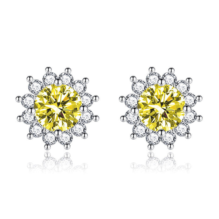 Boucles d'oreilles Muse en or jaune baignées de soleil