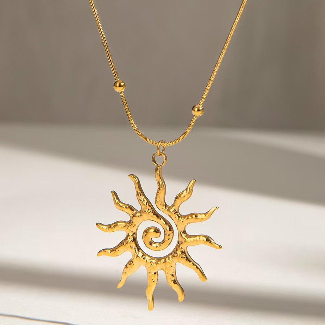 Ensemble Édition Or Solar avec boucles d'oreilles et collier