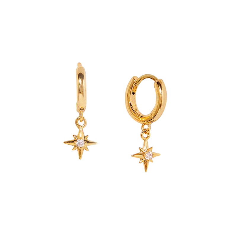 Les boucles d'oreilles Vudu blanches