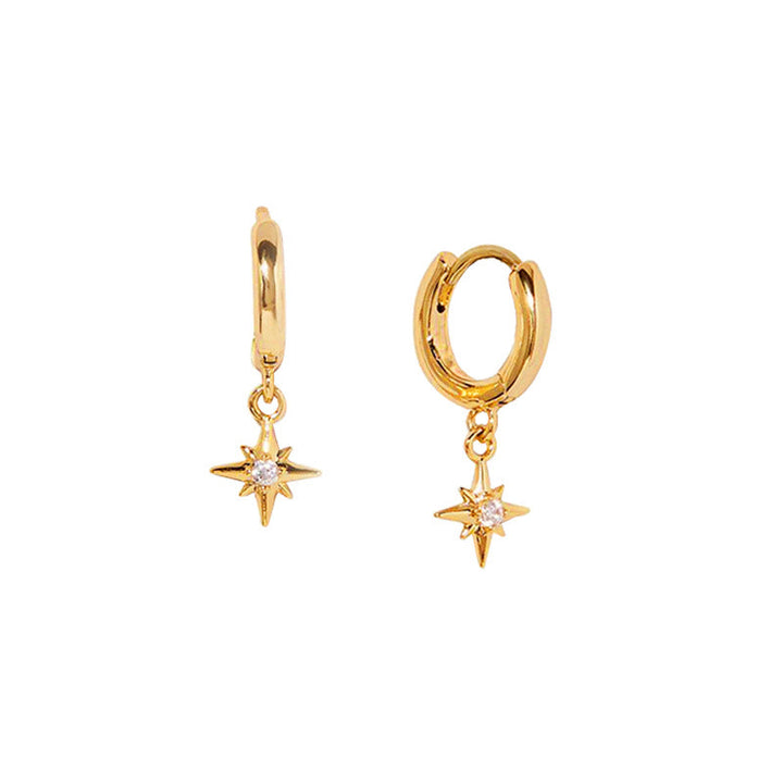 Les boucles d'oreilles Vudu blanches