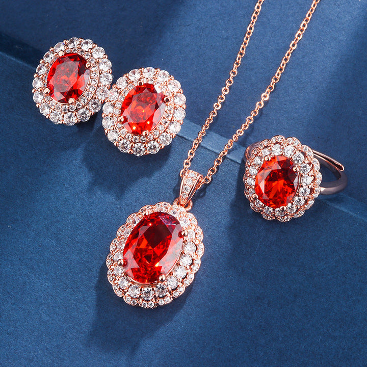 Parure de bijoux en or rose et rouge