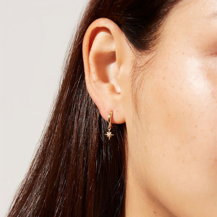 Les boucles d'oreilles Vudu en or