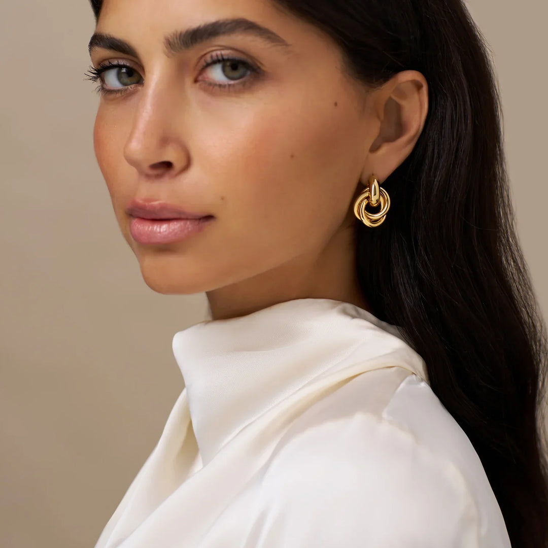 Boucles d'oreilles interconnectées en or