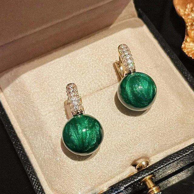 Boucles d'oreilles perle verte en or