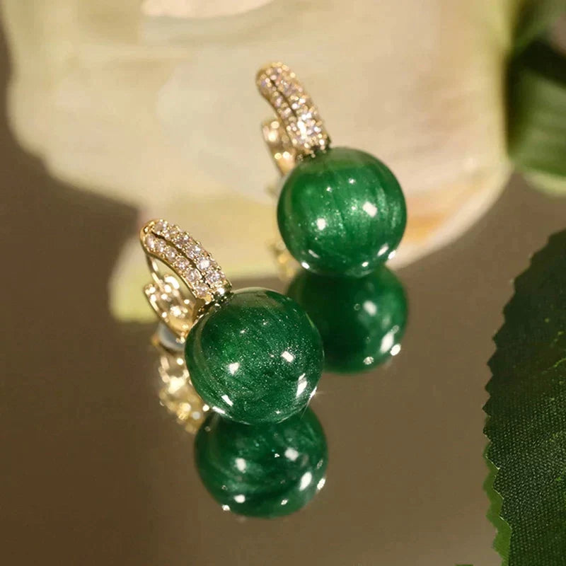 Boucles d'oreilles perle verte en or
