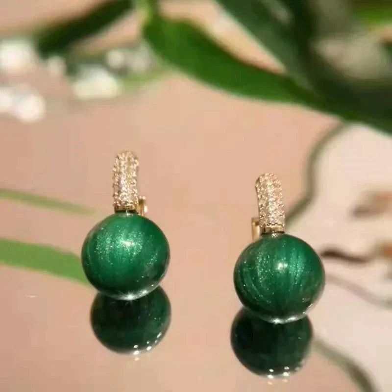 Boucles d'oreilles perle verte en or