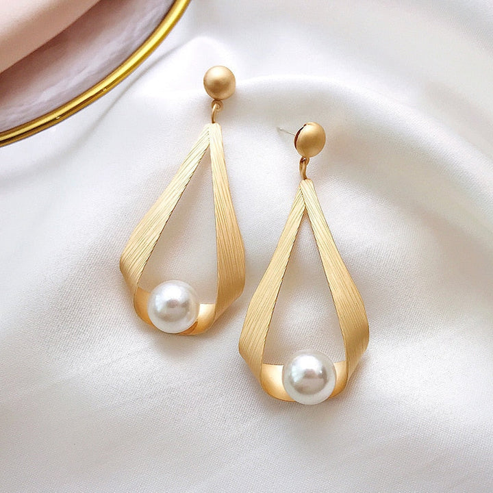 Boucles d'oreilles rondes en cristal et perles