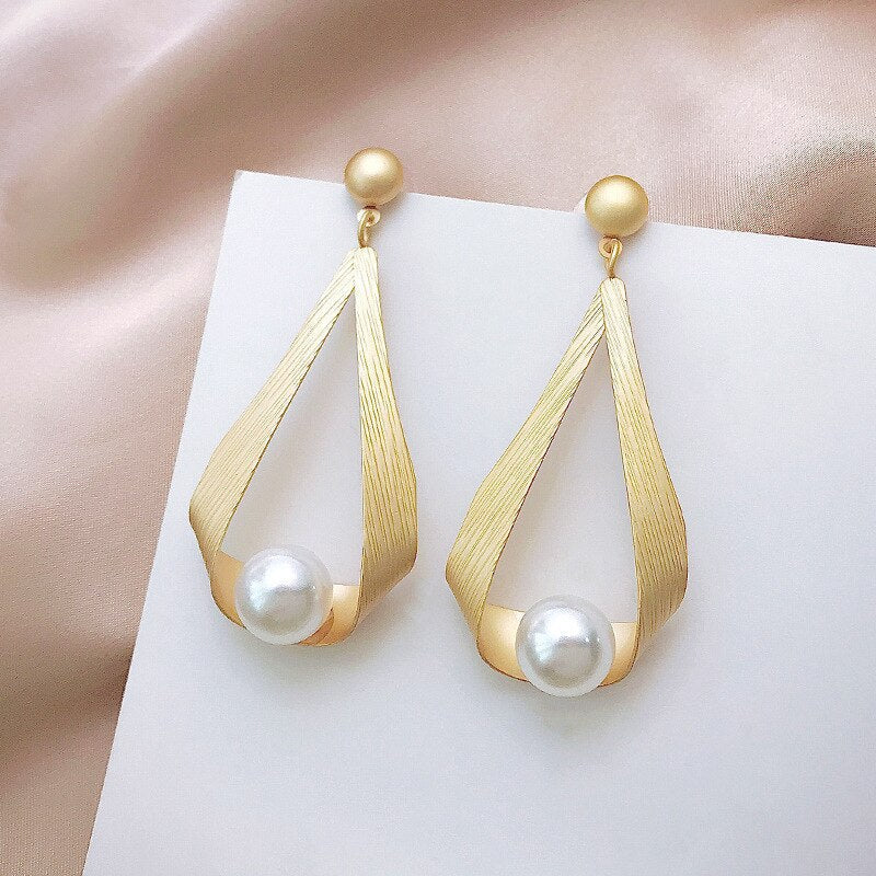 Boucles d'oreilles rondes en cristal et perles