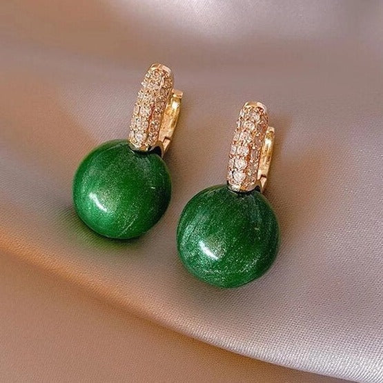 Boucles d'oreilles perle verte en or