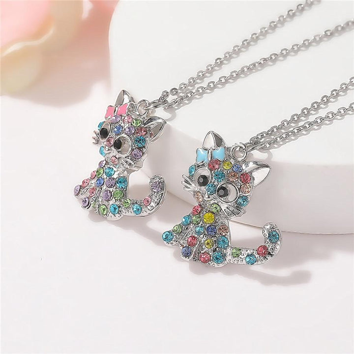 Collier pour bébé chat argenté avec accents en zirconia colorés